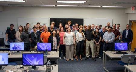 Group of men and women in a computer lab